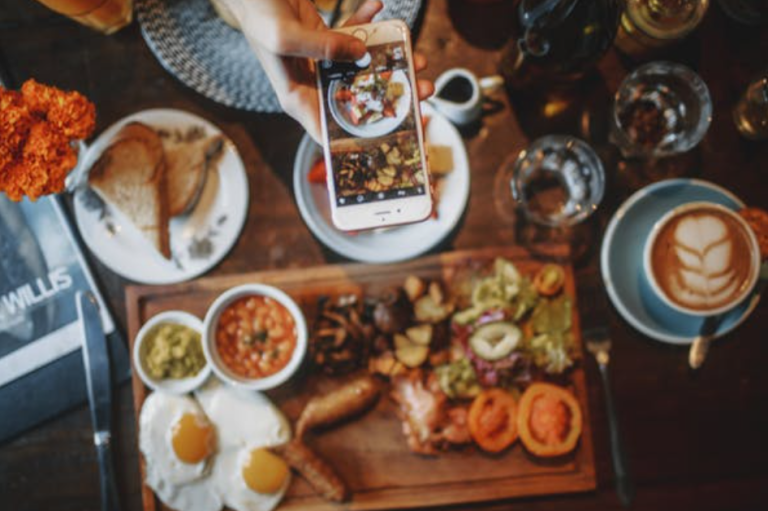 Influencer Taking Photos of Food