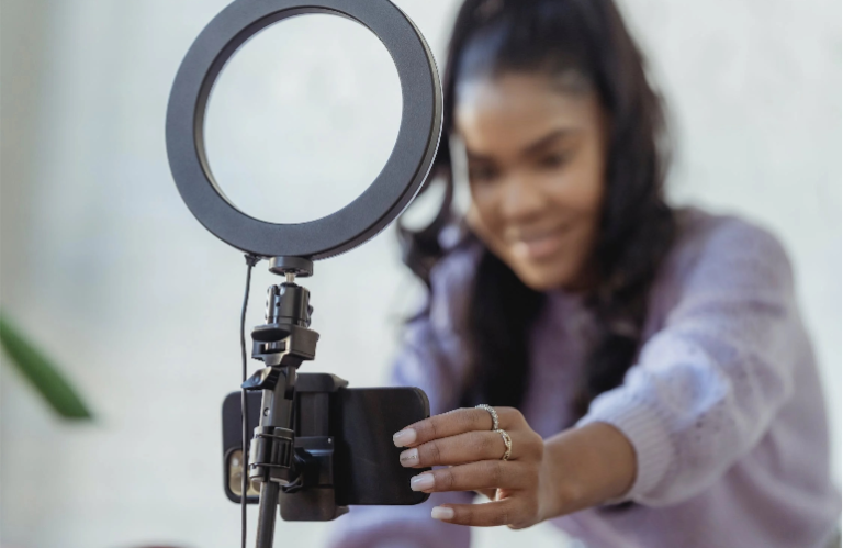 Young woman going to record a video on her phone.